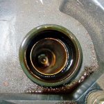 Causes of oil in engine spark plug wells, and how to solve the problem