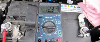 Car battery leakage current: norm and measurement